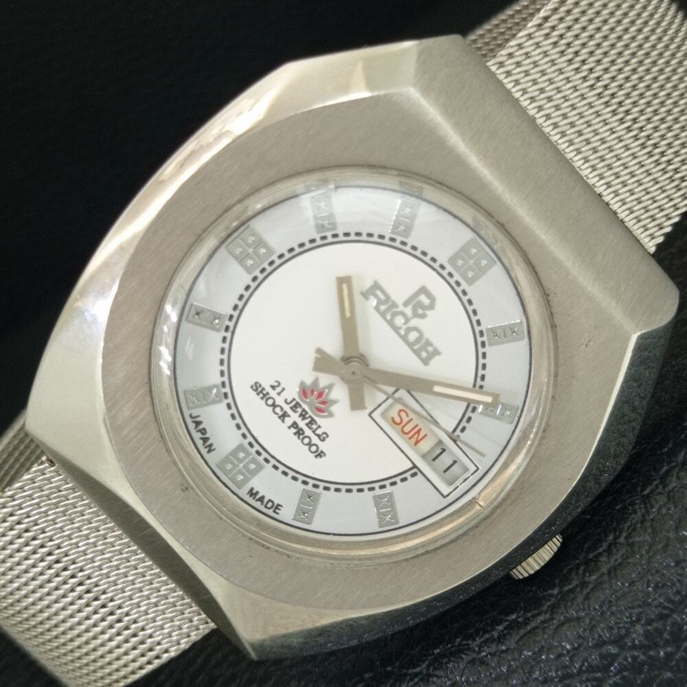 Vintage 1972 Ricoh Automatic Mens Silver Watch W/daydate & White accents
